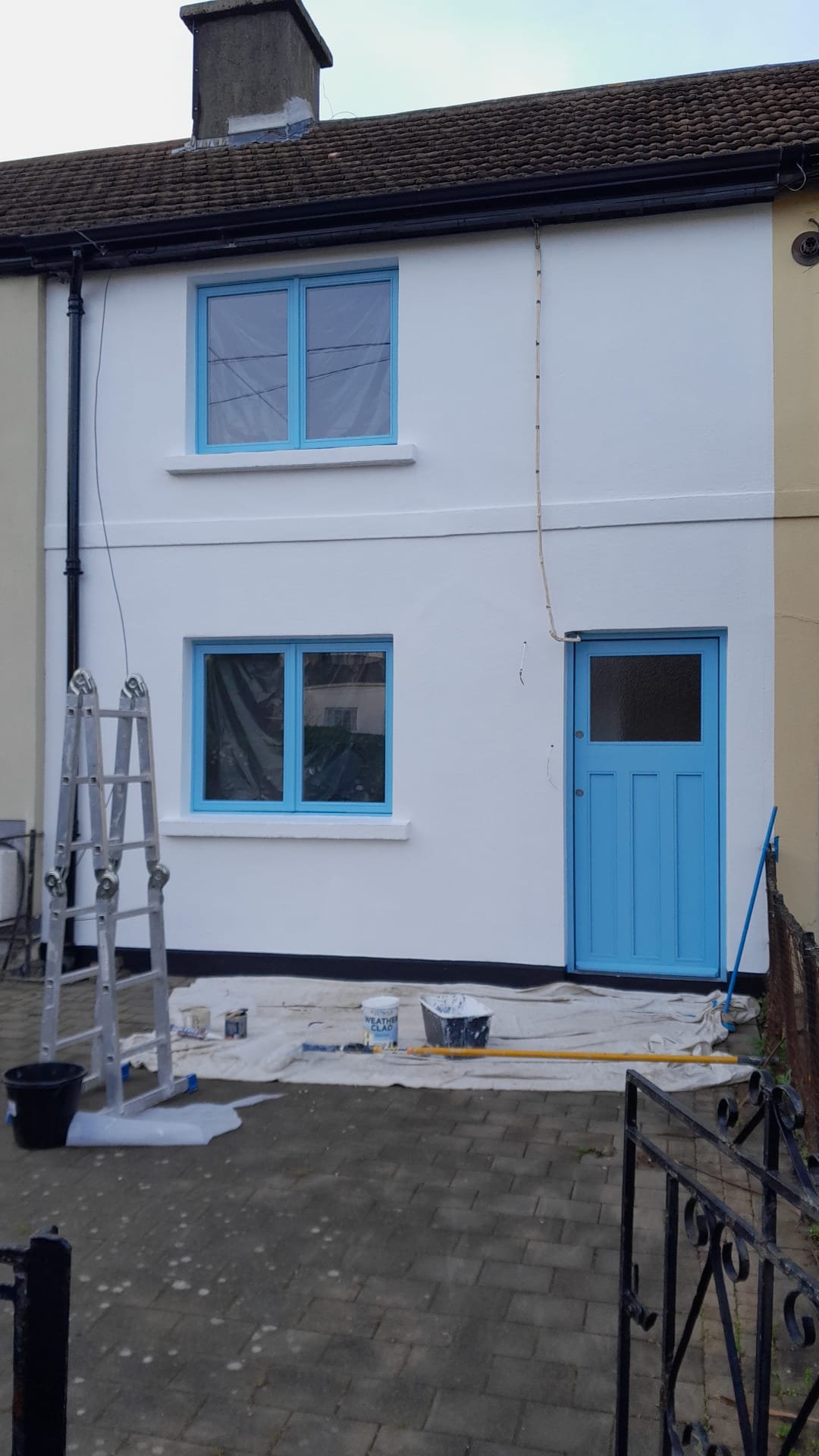 Exterior painting in progress stage 2
