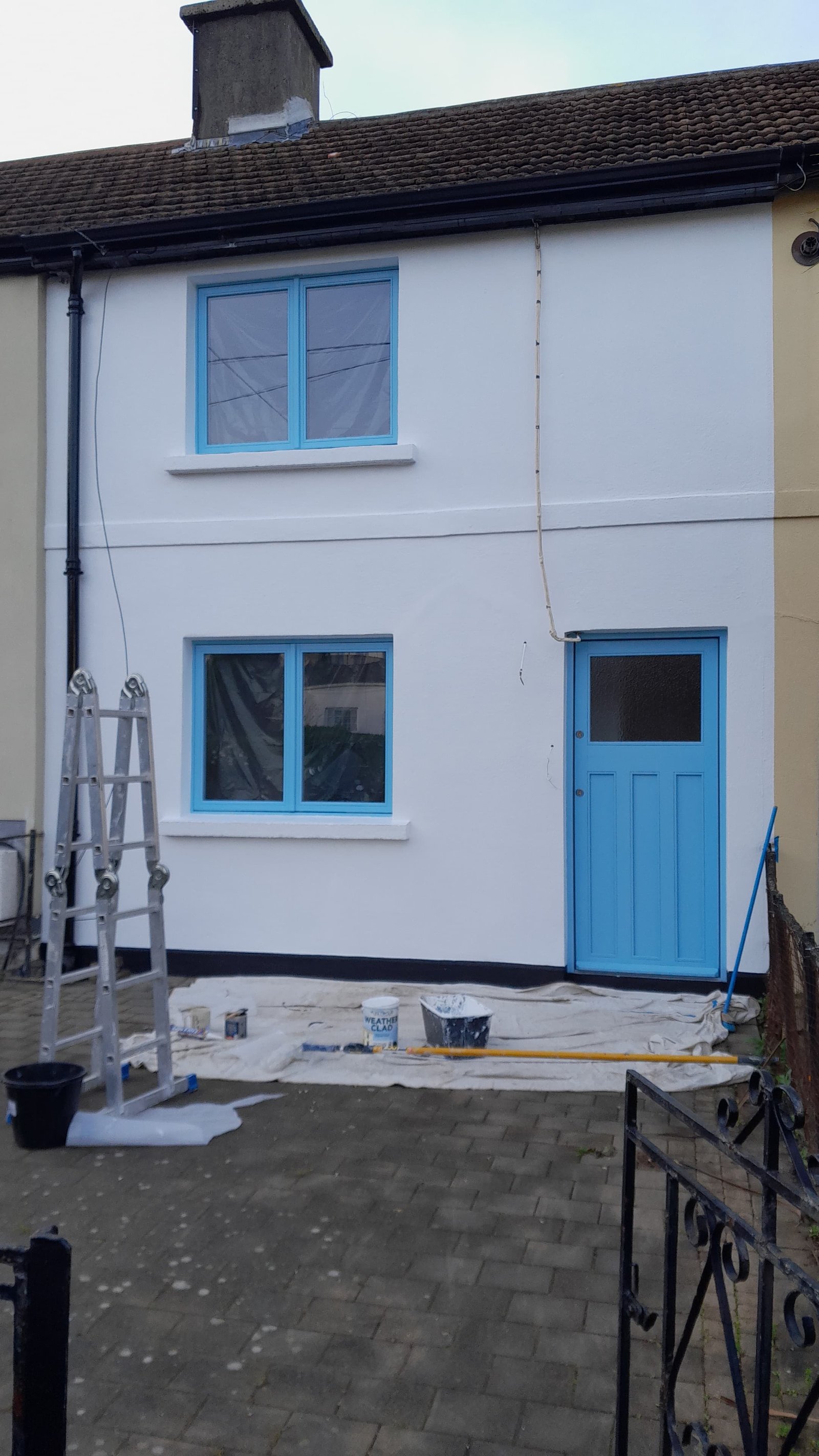 Exterior painting in progress stage 4