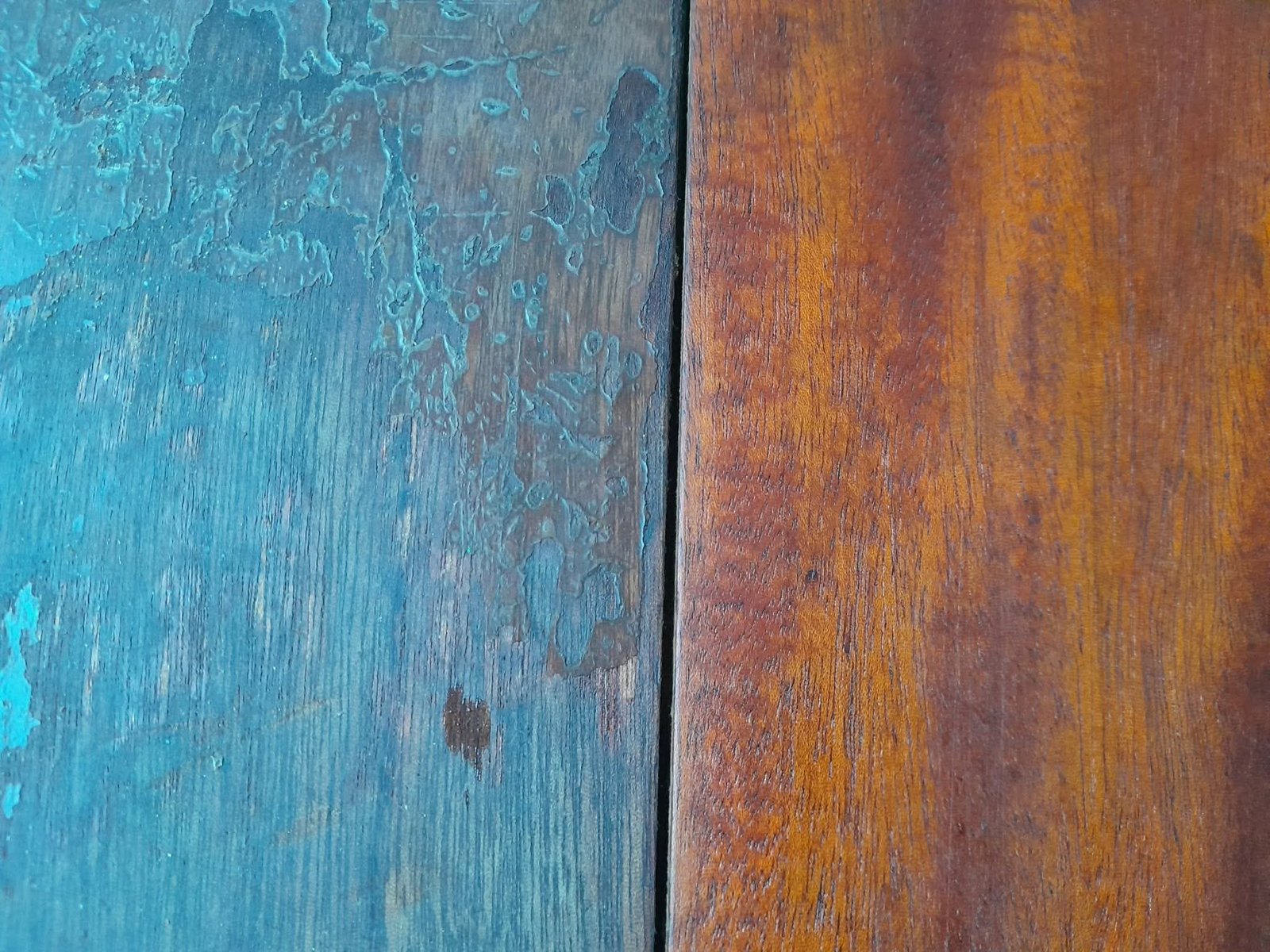 Wood surface with paint and damage removed